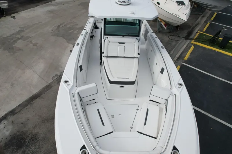  Yacht Photos Pics 2023 Blackfin 332 CC boat interior with spacious seating and modern design.