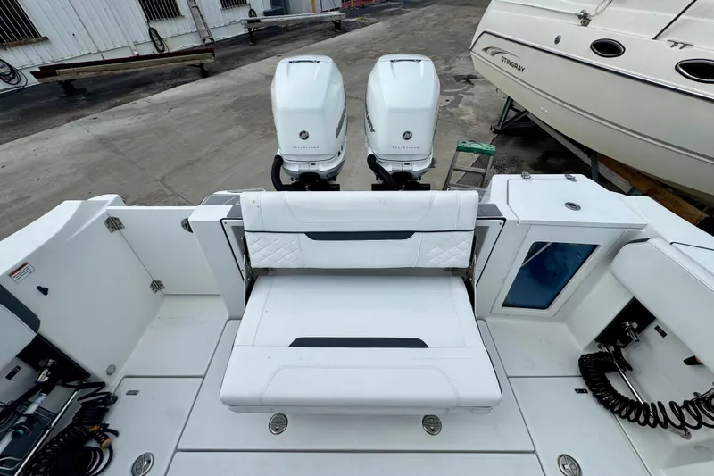  Yacht Photos Pics 2023 Blackfin 332 CC boat with dual engines and spacious seating area.