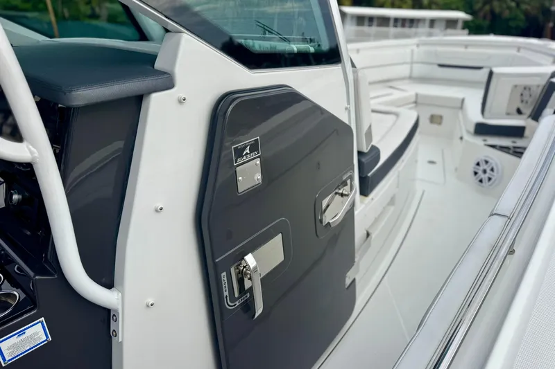  Yacht Photos Pics 2023 Blackfin 332 CC boat interior with sleek seating and modern design.