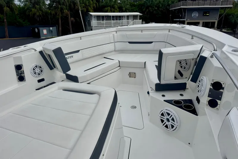  Yacht Photos Pics 2023 Blackfin 332 CC boat interior with white seating and built-in speakers.