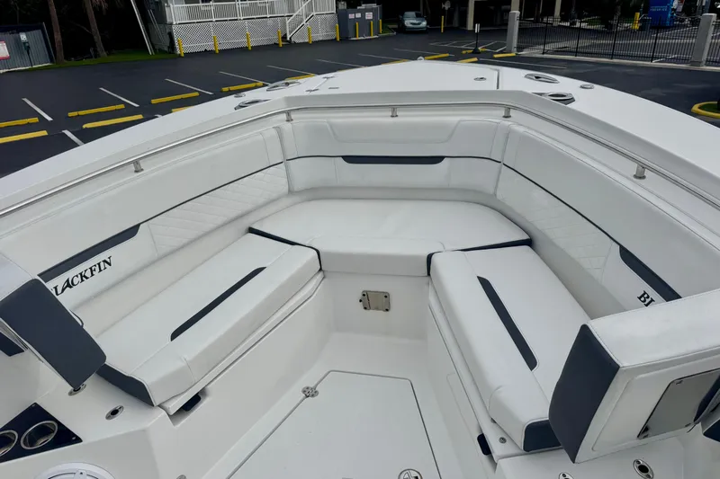  Yacht Photos Pics 2023 Blackfin 332 CC boat with spacious white seating area.