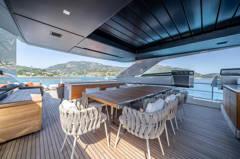 Blue Angel Yacht Photos Pics Luxurious Sanlorenzo SL 120 yacht deck with elegant dining area, 2021 model.