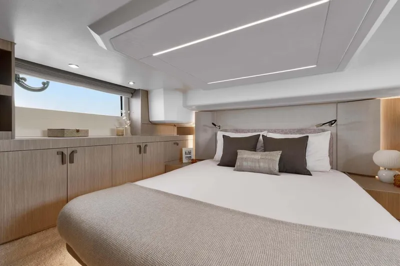  Yacht Photos Pics Manufacturer Provided Image: Luxurious bedroom interior of 2026 Prestige F4.3 yacht with modern design and elegant decor.