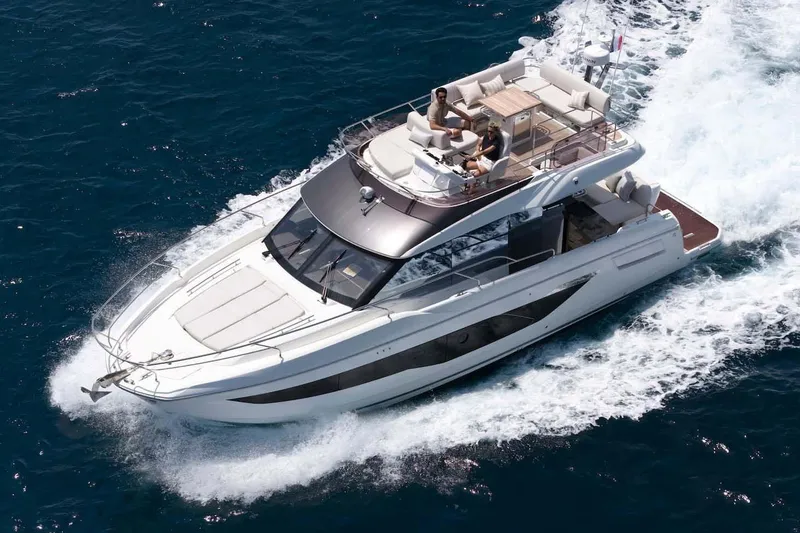  Yacht Photos Pics Manufacturer Provided Image: Luxurious 2026 Prestige F4.3 yacht cruising on open sea, showcasing sleek design and elegance.