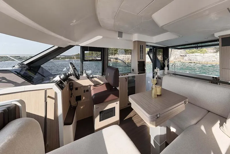  Yacht Photos Pics Manufacturer Provided Image: Luxurious interior of 2026 Prestige F4.3 yacht with modern seating and scenic ocean view.