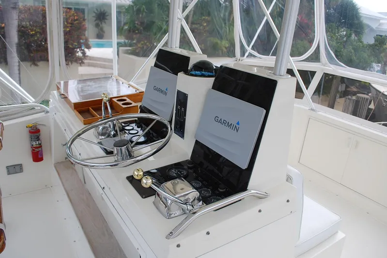 2 Jay's Yacht Photos Pics Helm of 1988 Viking 45 Convertible yacht with Garmin navigation system.