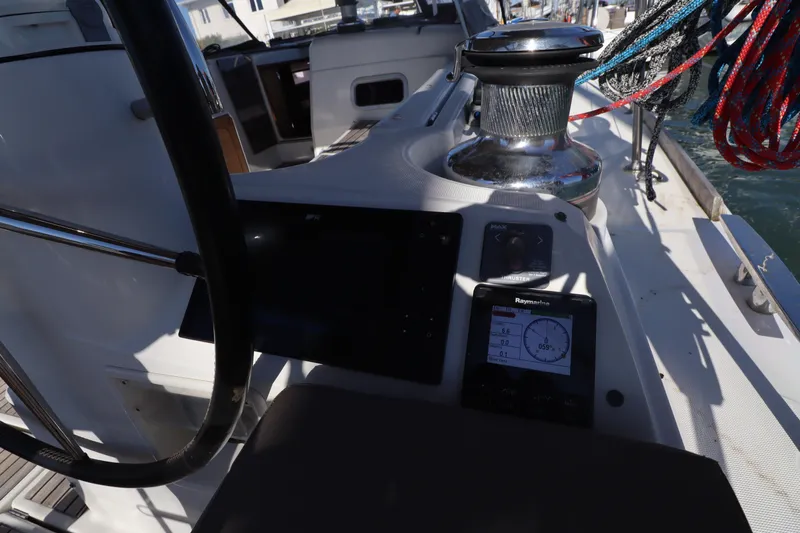 Marley 2 Yacht Photos Pics Cockpit of 2012 Jeanneau Sun Odyssey 509 sailboat with navigation instruments and winch.