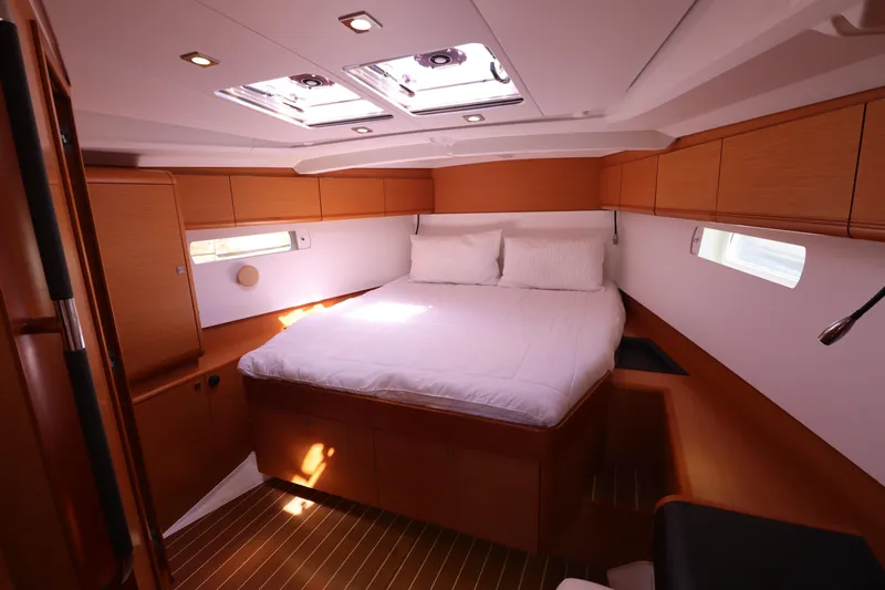 Marley 2 Yacht Photos Pics Luxurious cabin interior of 2012 Jeanneau Sun Odyssey 509 yacht with cozy bed.