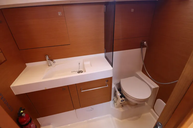 Marley 2 Yacht Photos Pics Bathroom interior of 2012 Jeanneau Sun Odyssey 509 yacht, featuring sink and toilet.