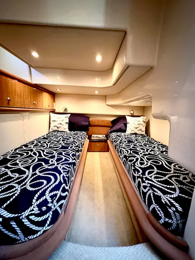 The Mystic Yacht Photos Pics 2001 Maxum 4600 SCB Limited Edition cabin with twin beds and nautical-themed decor.