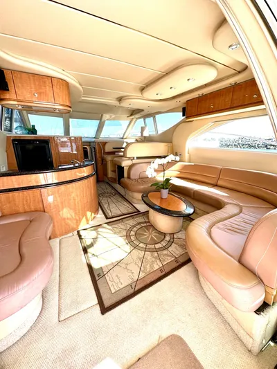 The Mystic Yacht Photos Pics Luxurious interior of 2001 Maxum 4600 SCB Limited Edition yacht with elegant seating and decor.