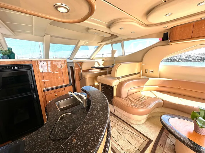 The Mystic Yacht Photos Pics Luxurious interior of 2001 Maxum 4600 SCB Limited Edition yacht with elegant seating and modern amenities.