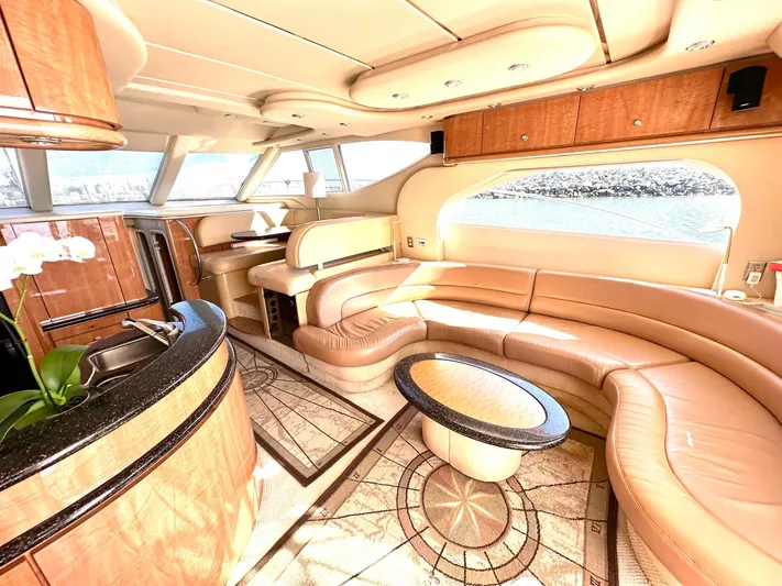 The Mystic Yacht Photos Pics Luxurious interior of 2001 Maxum 4600 SCB Limited Edition yacht with elegant seating and modern design.