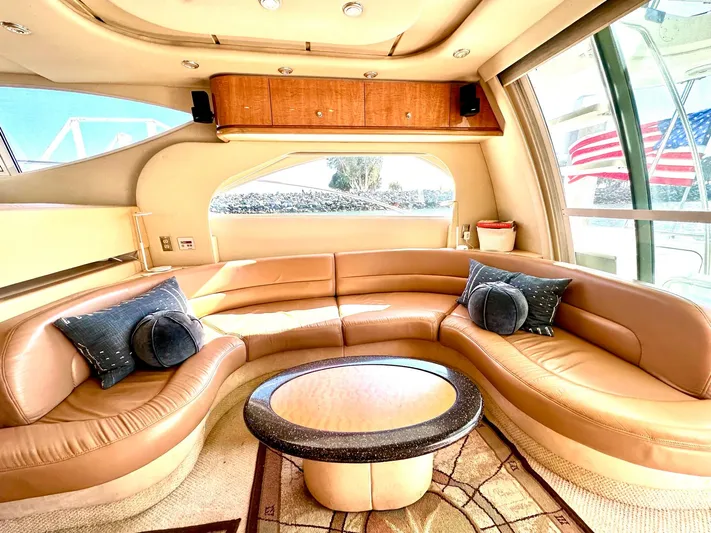 The Mystic Yacht Photos Pics Luxurious interior of 2001 Maxum 4600 SCB yacht with elegant seating and modern decor.