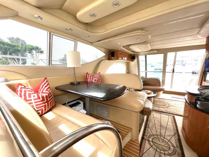 The Mystic Yacht Photos Pics Luxurious interior of 2001 Maxum 4600 SCB yacht with elegant seating and modern decor.