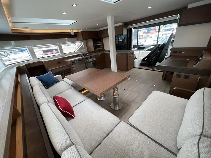  Yacht Photos Pics Luxurious interior of 2023 Lagoon 55 yacht with modern furnishings and spacious layout.