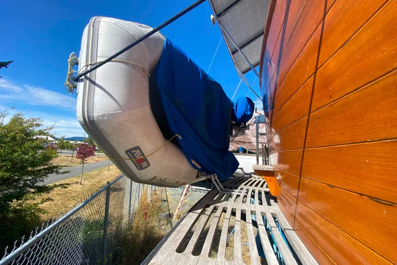  Yacht Photos Pics Inflatable boat secured on 1980 Ocean Alexander 50 MK1 yacht, sunny day.