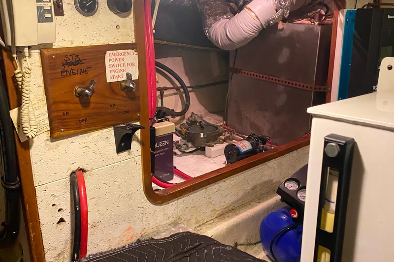  Yacht Photos Pics Engine room of 1980 Ocean Alexander 50 MK1 yacht with control panel and equipment.