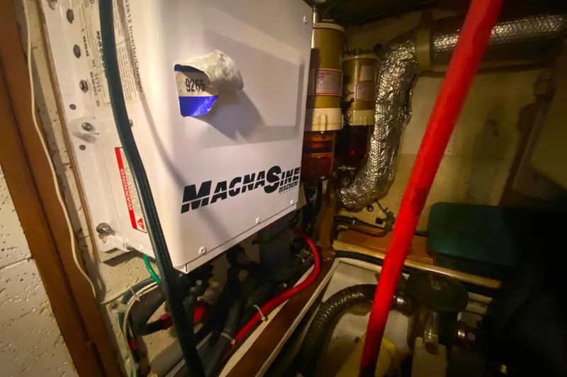  Yacht Photos Pics Engine room of 1980 Ocean Alexander 50 MK1 with MagnaSine inverter and wiring.