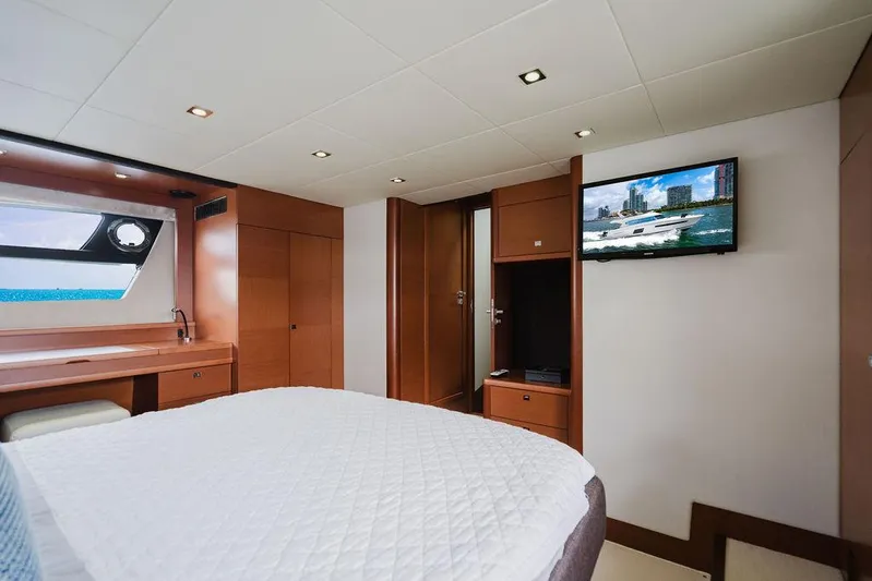 Worldwide Yacht Photos Pics Luxurious cabin interior of 2014 Prestige 620 Fly yacht with modern amenities.