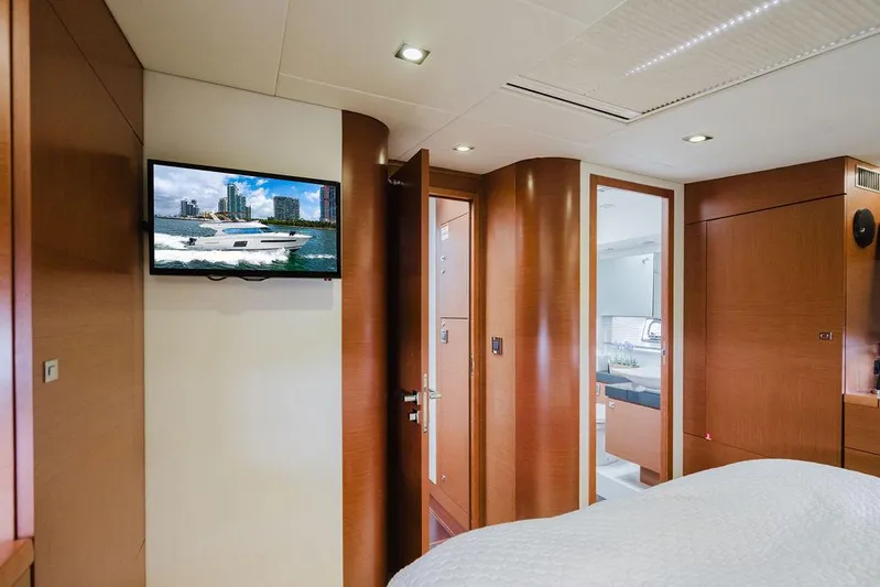 Worldwide Yacht Photos Pics Luxurious interior of 2014 Prestige 620 Fly yacht with modern amenities and wood finishes.