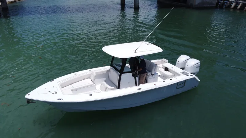  Yacht Photos Pics 2024 Sea Hunt Gamefish 27 boat with forward seating on calm water.
