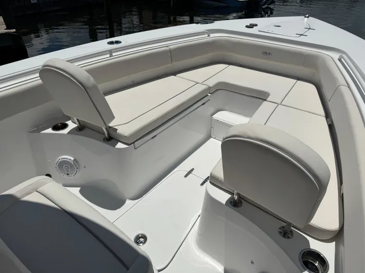  Yacht Photos Pics 2024 Sea Hunt Gamefish 27 Forward Seating with cushioned seats and storage compartments.