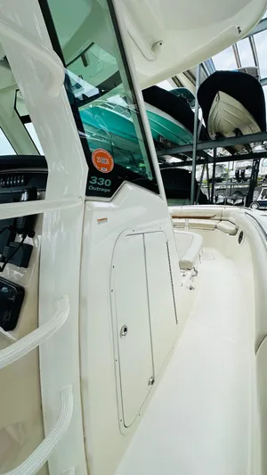  Yacht Photos Pics 2020 Boston Whaler 330 Outrage boat interior with sleek design and modern features.