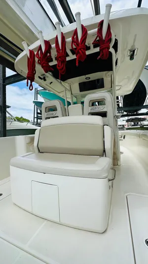  Yacht Photos Pics 2020 Boston Whaler 330 Outrage interior with seating and rod holders.