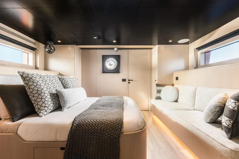 Vanguard Yacht Photos Pics Luxurious interior of 2023 Naval Yachts XPM 78, featuring elegant bedroom design.