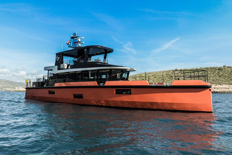 Vanguard Yacht Photos Pics 2023 Naval Yachts XPM 78 in vibrant orange, cruising on a sunny day.