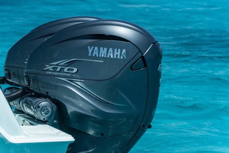  Yacht Photos Pics Yamaha XTO Offshore engine on 2024 Contender 35 ST in clear blue water.