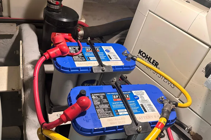 Double Eagle Yacht Photos Pics Engine room of 2004 Silverton 42 Convertible with Optima batteries and Kohler generator.