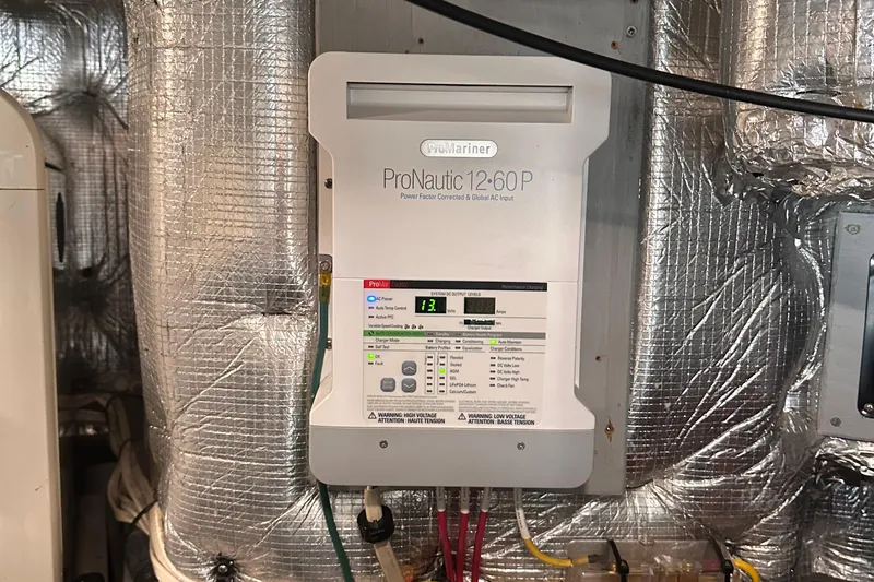 Double Eagle Yacht Photos Pics ProMariner ProNautic 12-60P charger in 2004 Silverton 42 Convertible yacht engine room.