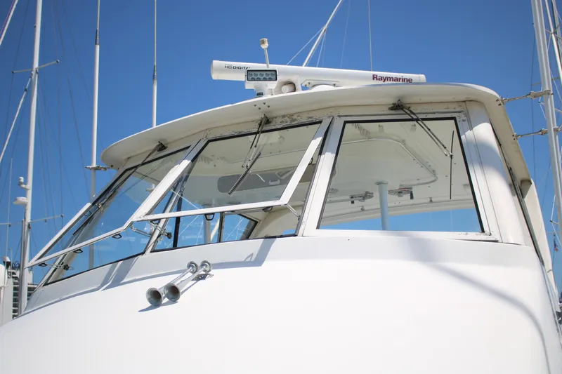 Sweetemocian Yacht Photos Pics 1999 Ocean Yachts yacht with Raymarine equipment, featuring sleek windows and a white exterior.