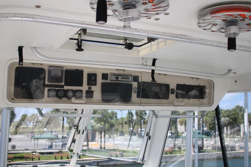 Sweetemocian Yacht Photos Pics Control panel of a 1999 Ocean Yachts model, featuring navigation and communication equipment.