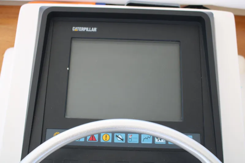Sweetemocian Yacht Photos Pics Caterpillar control panel on 1999 Ocean Yachts model, featuring various function buttons.