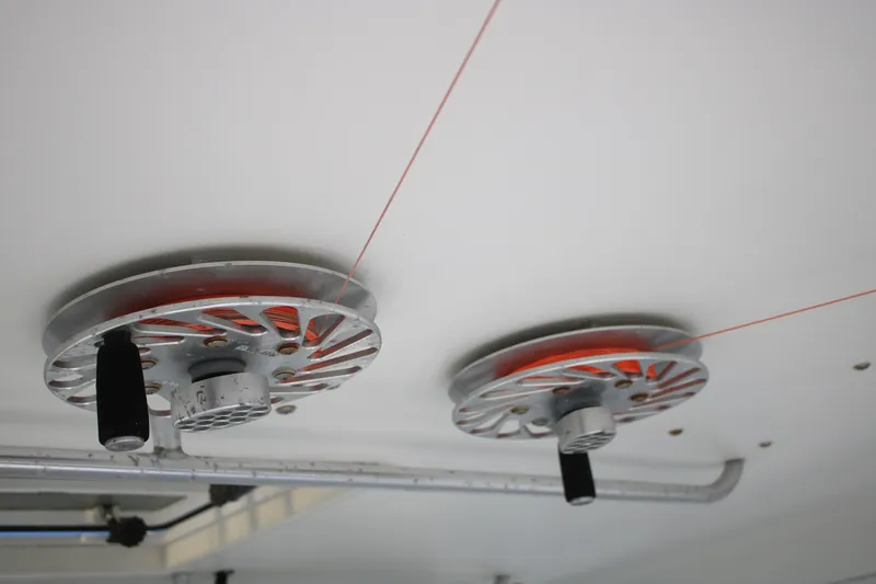 Sweetemocian Yacht Photos Pics Ceiling-mounted pulleys on a 1999 Ocean Yachts model, showcasing mechanical components.