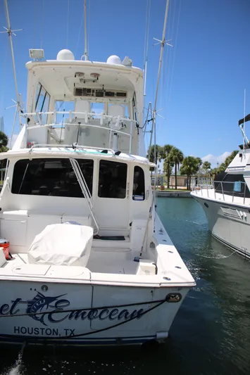 Sweetemocian Yacht Photos Pics 1999 Ocean Yachts model docked in sunny marina, Houston, Texas.