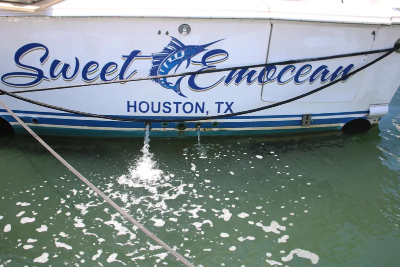 Sweetemocian Yacht Photos Pics 1999 Ocean Yachts model with "Sweet EmOcean" name, docked in Houston, TX.