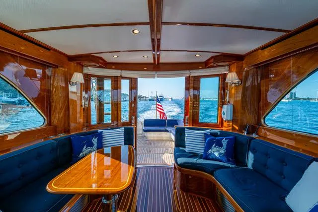 Virginia Yacht Photos Pics Luxurious interior of 2013 Hinckley Talaria 48 Flybridge yacht with elegant wood finish.