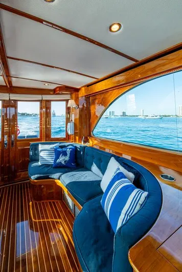 Virginia Yacht Photos Pics Luxurious 2013 Hinckley Talaria 48 Flybridge interior with elegant wood finish and ocean view.