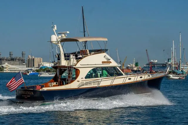 Virginia Yacht Photos Pics 2013 Hinckley Talaria 48 Flybridge yacht cruising in a busy harbor.