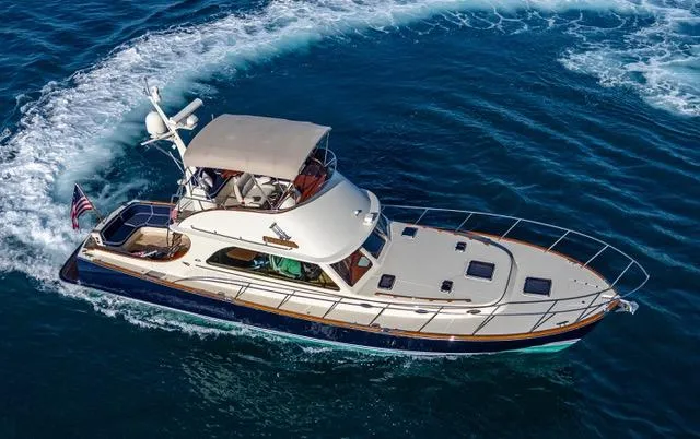 Virginia Yacht Photos Pics 2013 Hinckley Talaria 48 Flybridge yacht cruising on open water.