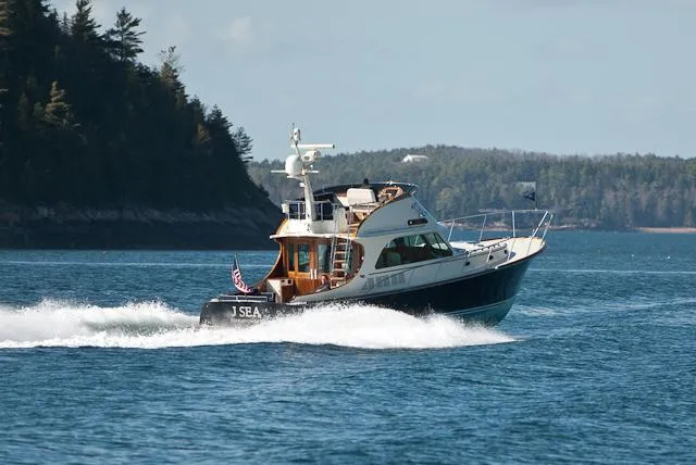 Virginia Yacht Photos Pics 2013 Hinckley Talaria 48 Flybridge cruising on a scenic waterway.