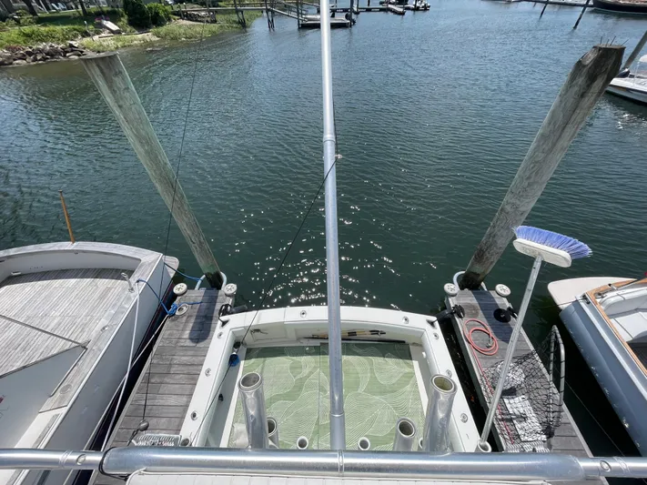  Yacht Photos Pics Overhead view of a 2002 Carolina Classic 35 boat docked at a marina.