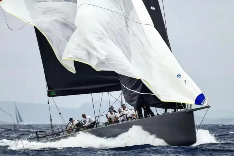 North Star Yacht Photos Pics Sailing yacht Judel and Vrolijk Maxi 72, 2009, cutting through waves with full sails.