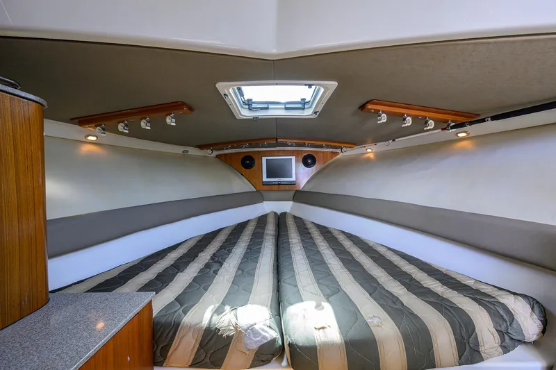 Nauti-hooker Yacht Photos Pics Pursuit 34 Nauti-Hooker - Forward Berth