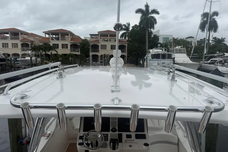 Day Dreams Yacht Photos Pics 2021 Intrepid 409 Valor boat docked, featuring sleek design and modern amenities.