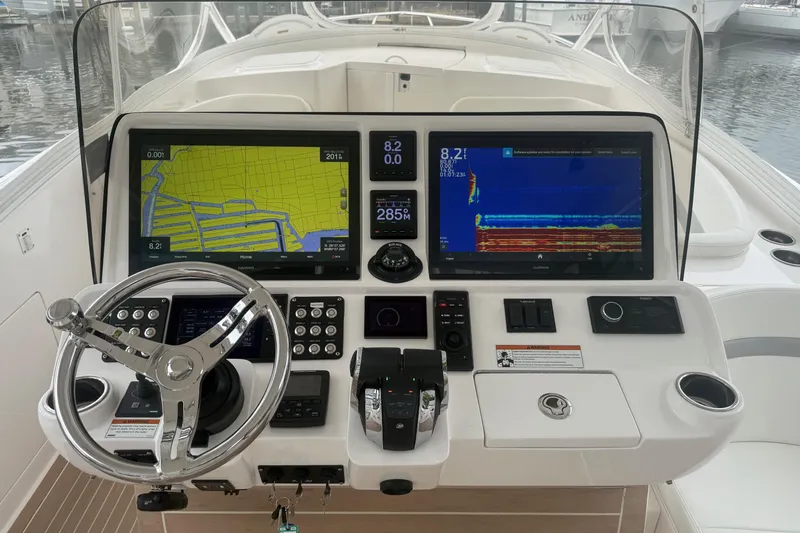 Day Dreams Yacht Photos Pics Helm of 2021 Intrepid 409 Valor with advanced navigation displays and controls.
